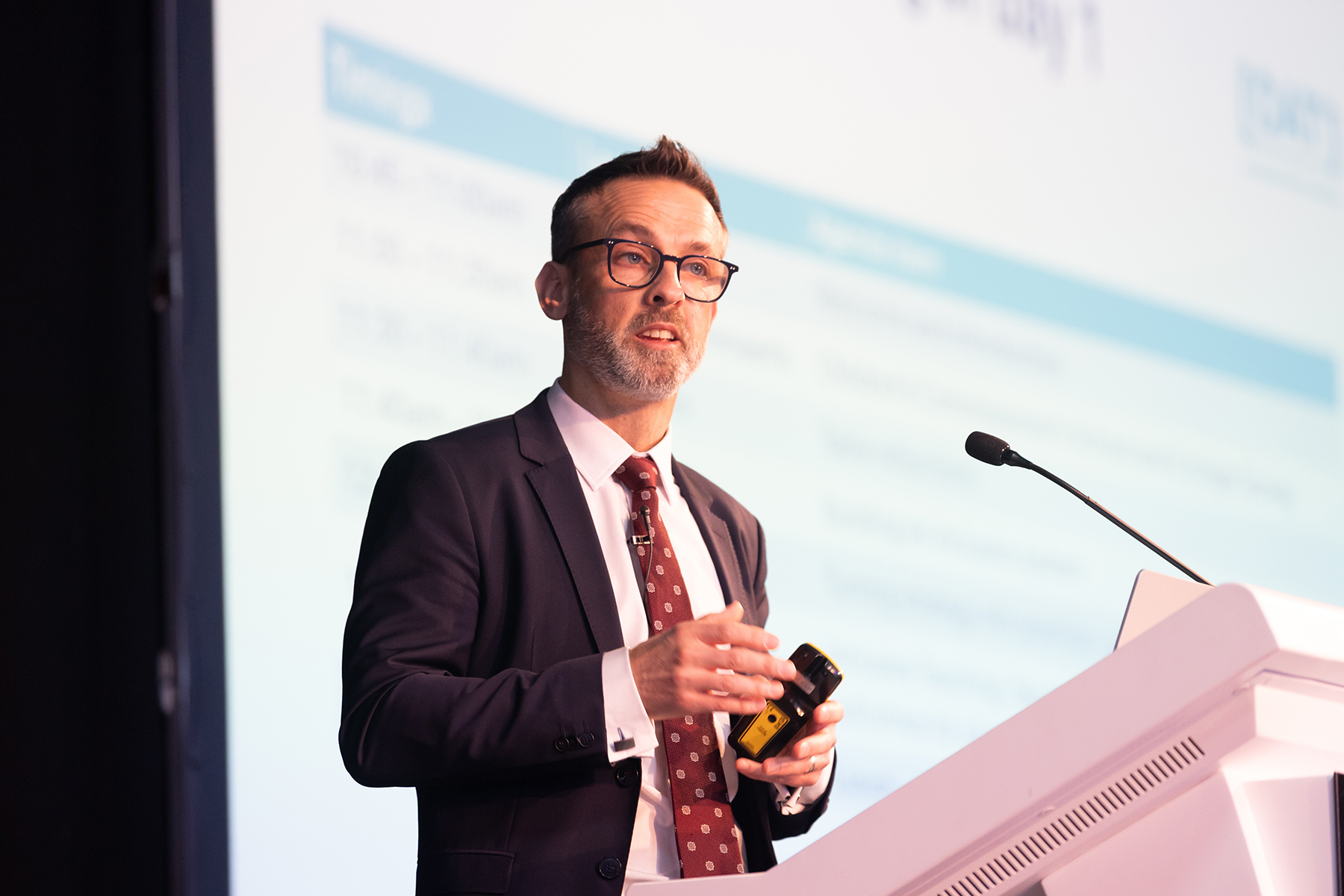 CEO Tom Rees speaking at conference