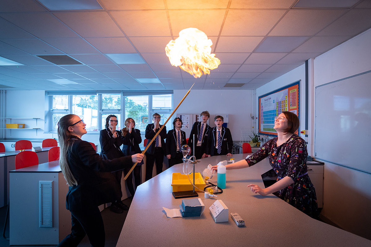 Teacher and students in science class